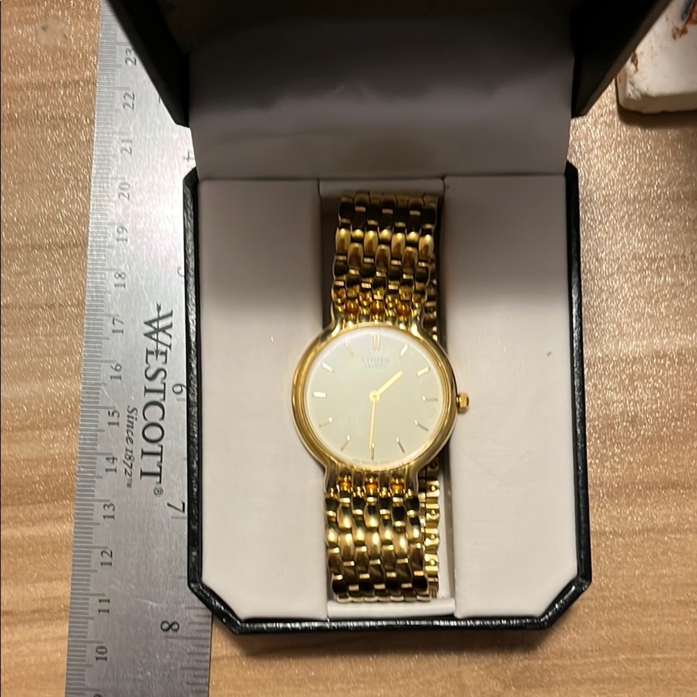 Citizen Gold Watch with White Dial